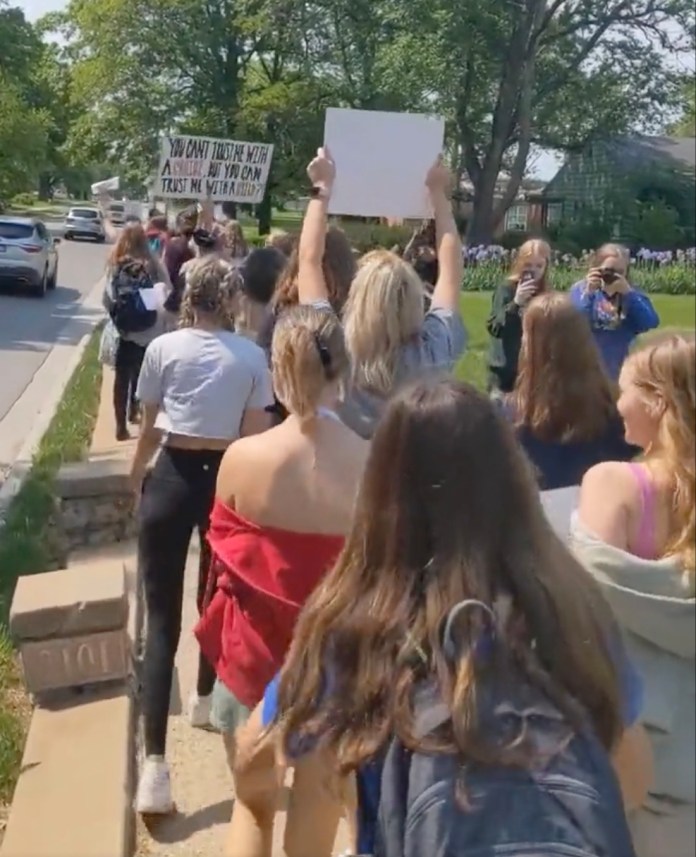 Young activists marching in Kansas for abortion rights